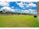 Spacious backyard surrounded by fence and trees at 1312 Sugarwood St, Davenport, FL 33837