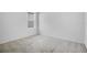 Neutral bedroom with natural light and carpet flooring at 1312 Sugarwood St, Davenport, FL 33837