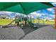 Community playground features safe, modern equipment for enjoyment and recreation at 1312 Sugarwood St, Davenport, FL 33837