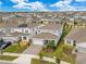 Aerial view of a residential neighborhood highlighting neat landscaping and attractive homes at 13330 Panama Beach Ct, Orlando, FL 32827