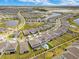 Community aerial view showcasing waterscapes and well-maintained properties in the neighborhood at 13330 Panama Beach Ct, Orlando, FL 32827
