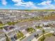 Community aerial view showcasing a well-designed neighborhood with modern homes at 13330 Panama Beach Ct, Orlando, FL 32827