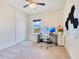 Bright bedroom featuring a computer desk, and geometric modern hexagon wall art at 13330 Panama Beach Ct, Orlando, FL 32827