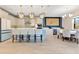 Bright, spacious kitchen with a large island, pendant lighting, and modern appliances at 13330 Panama Beach Ct, Orlando, FL 32827