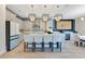 Modern kitchen with a large island, stainless steel appliances, and pendant lighting at 13330 Panama Beach Ct, Orlando, FL 32827