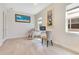 Bright office space with tiled floors, multiple windows, and a modern desk setup at 13330 Panama Beach Ct, Orlando, FL 32827