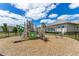 Well-maintained playground with multiple slides and play areas, fenced for safety and fun at 13330 Panama Beach Ct, Orlando, FL 32827