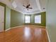 Spacious bedroom featuring a trey ceiling, fan, and dual windows at 1432 Stargazer Ter, Sanford, FL 32771