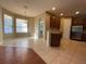 Dining area with tile flooring, kitchen view, and ample natural light at 1432 Stargazer Ter, Sanford, FL 32771