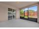 Screened lanai with sliding door access to the backyard, providing a relaxing outdoor space at 16780 Meadows St, Clermont, FL 34714