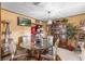 Cozy dining room features a glass table, chandelier, and built-in display cabinet at 2213 Bates Ave, Eustis, FL 32726