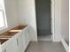 Bathroom area with installed cabinets and tile flooring at 2467 Zuni Road, St Cloud, FL 34771