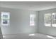 Large bedroom with multiple windows, providing ample natural light and scenic views at 2467 Zuni Road, St Cloud, FL 34771