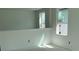 Bright hallway with natural light, perfect for connecting living spaces with style and functionality at 2467 Zuni Road, St Cloud, FL 34771
