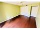 A spacious bedroom features wood floors, a ceiling fan and double closets for all of your storage needs at 248 Crown Oaks Way, Longwood, FL 32779