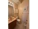 Bathroom with vanity, toilet, and medicine cabinet at 2530 Baykal Dr, Kissimmee, FL 34746