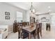 Dining room view adjacent to the kitchen, showcasing a seamless flow for easy entertaining at 2766 Purple Meadow Ct, Minneola, FL 34715