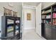 Well-organized office space with a dark cabinet and built-in bookcase and display case at 2766 Purple Meadow Ct, Minneola, FL 34715