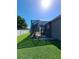 Enjoy this expansive backyard with a screened patio and manicured lawn at 2863 Middleton Cir, Kissimmee, FL 34743