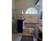 Bathroom featuring a tub, shower with glass doors, and white tiled flooring at 2863 Middleton Cir, Kissimmee, FL 34743