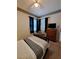Comfortable bedroom with natural light, neutral tones, and a cozy atmosphere at 2863 Middleton Cir, Kissimmee, FL 34743