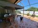 Spacious covered patio with a tile floor, perfect for outdoor dining and relaxation at 2863 Middleton Cir, Kissimmee, FL 34743