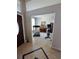 Inviting foyer showcasing a tiled floor and view into an exercise room at 2863 Middleton Cir, Kissimmee, FL 34743