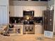 Well-equipped kitchen featuring stainless steel appliances and ample countertop space at 2863 Middleton Cir, Kissimmee, FL 34743