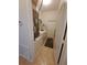 Functional laundry room with washer, dryer, and storage shelves at 2863 Middleton Cir, Kissimmee, FL 34743