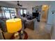 Bright and airy living room with comfortable furniture, tile floors, and view to outdoor living space at 2863 Middleton Cir, Kissimmee, FL 34743