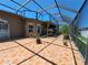 Spacious screened-in patio area with tile flooring, offering a great outdoor living space at 2863 Middleton Cir, Kissimmee, FL 34743
