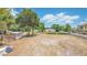 Spacious backyard with lake views and an outdoor gazebo at 2918 Croton Rd, Apopka, FL 32703