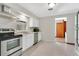 Well-lit kitchen featuring stainless steel appliances and sleek countertops at 2918 Croton Rd, Apopka, FL 32703