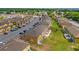 Spacious residential area featuring townhomes, ample parking, and well-kept green spaces at 318 Australian Way, Davenport, FL 33897