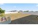 Expansive backyard featuring a garden, with a white fence, offering privacy and space for outdoor activities at 3341 Lounging Wren Ln, Bartow, FL 33830