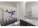 Unique bathroom featuring a whale shower curtain, vanity with granite top, and modern fixtures at 3341 Lounging Wren Ln, Bartow, FL 33830