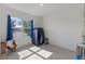 Bright bedroom featuring a window and unique sauna feature at 3341 Lounging Wren Ln, Bartow, FL 33830