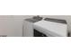 Clean laundry room featuring a modern white washer and dryer set at 3341 Lounging Wren Ln, Bartow, FL 33830