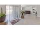 Bright living area with sliding glass door access to the outdoor space at 3341 Lounging Wren Ln, Bartow, FL 33830