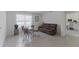 Cozy living room featuring lots of space, neutral colors, and tile floors at 3341 Lounging Wren Ln, Bartow, FL 33830