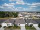 Aerial neighborhood view showcasing similar homes, well-maintained lawns, and a Gathering-friendly atmosphere at 3341 Lounging Wren Ln, Bartow, FL 33830