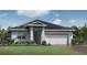 Charming single-story home featuring a two-car garage and a well-manicured lawn at 3450 Mclain Preserve Pt, Sanford, FL 32771