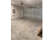 Spacious two car garage with modern door and electric door opener at 3450 Mclain Preserve Pt, Sanford, FL 32771