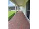 Outdoor patio with brick flooring and a view of the backyard at 3450 Mclain Preserve Pt, Sanford, FL 32771