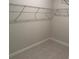 Walk-in closet featuring tiled floors and wire shelving at 3450 Mclain Preserve Pt, Sanford, FL 32771