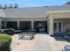 Community picnic area with tables and pathway at 4001 San Sabastian Dr # 107, Kissimmee, FL 34741