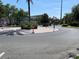 The attractive community entrance features well-kept landscaping and neatly manicured streets at 4001 San Sabastian Dr # 107, Kissimmee, FL 34741