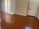 Spacious living area with tile flooring and sliding glass doors, providing a versatile living space at 4001 San Sabastian Dr # 107, Kissimmee, FL 34741