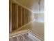 Basement stairs with painted wood trim and vinyl-look flooring descending to the lower level at 4001 San Sabastian Dr # 107, Kissimmee, FL 34741
