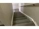 Staircase featuring wood-look steps with a white railing at 4001 San Sabastian Dr # 107 Of 51, Kissimmee, FL 34741
